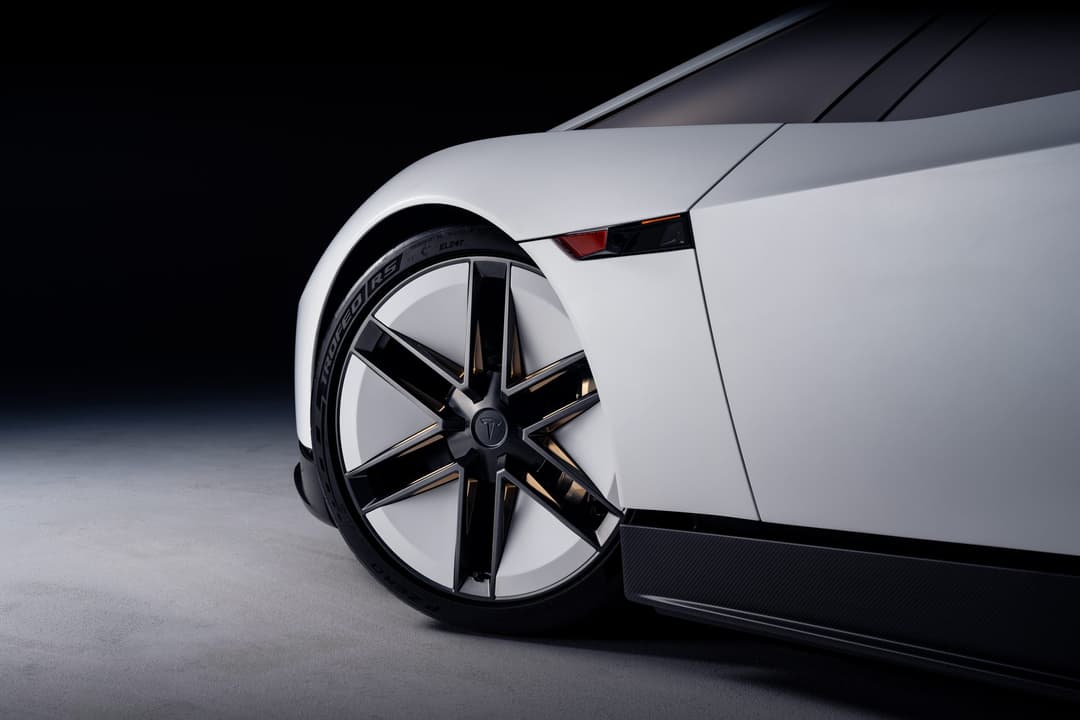 Close-up of the Tesla Roadster's front wheel and aerodynamic wheel cover